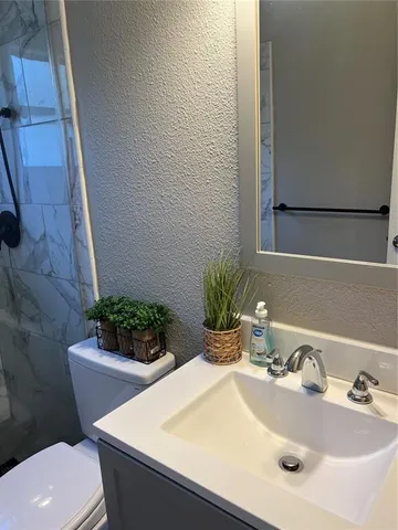 a view of outdoor space with deck and trees