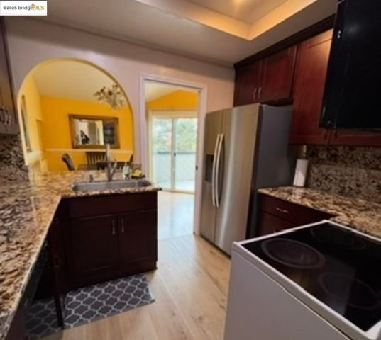 a living room with a couch and a flat screen tv