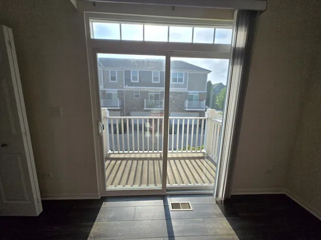 a view of porch with wooden floor