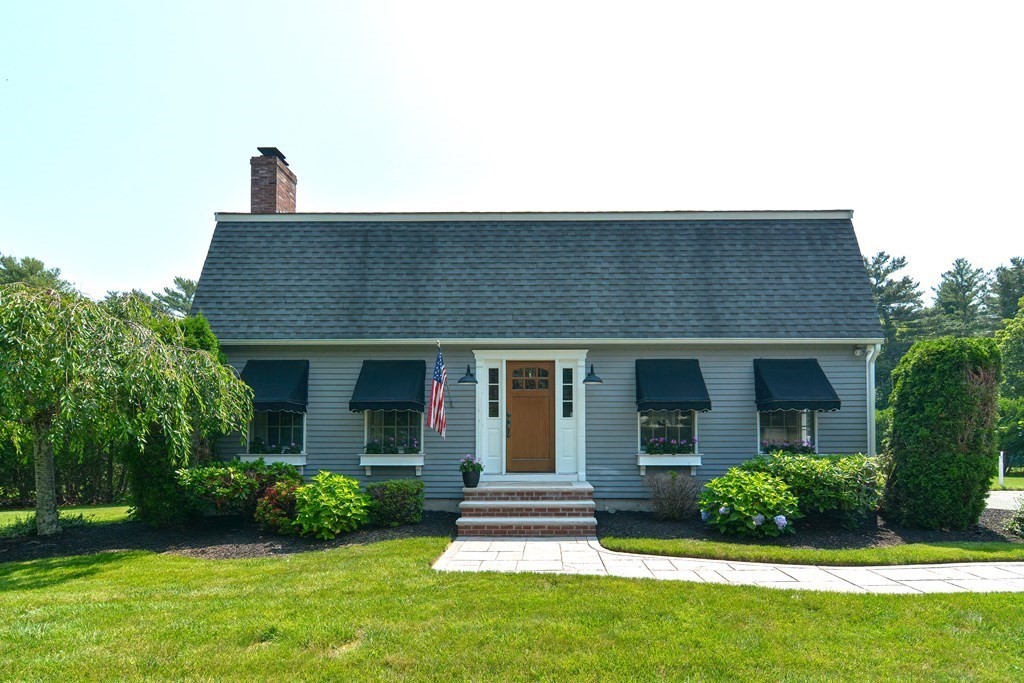 6 Reservation Road Acushnet, MA 02743 - Photo 2 of 42 a front view of a house with a yard
