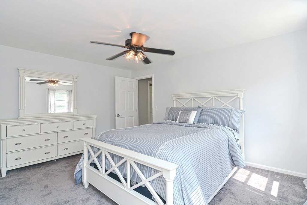 6 Reservation Road Acushnet, MA 02743 - Photo 30 of 42 a bedroom with a bed and a window