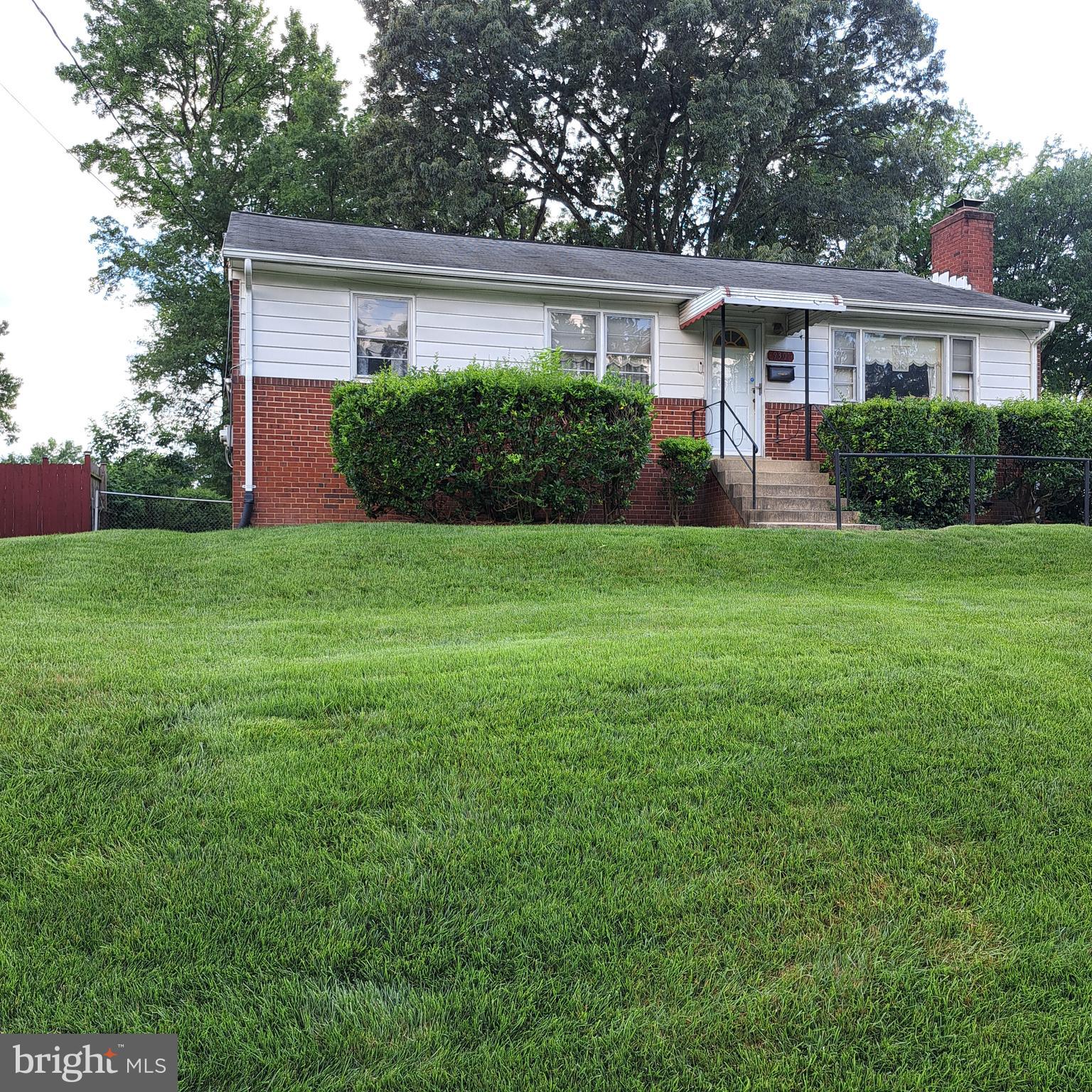 a house view with a garden space