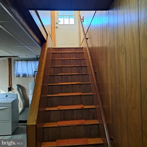 a view of livingroom with hardwood floor and a ceiling fan