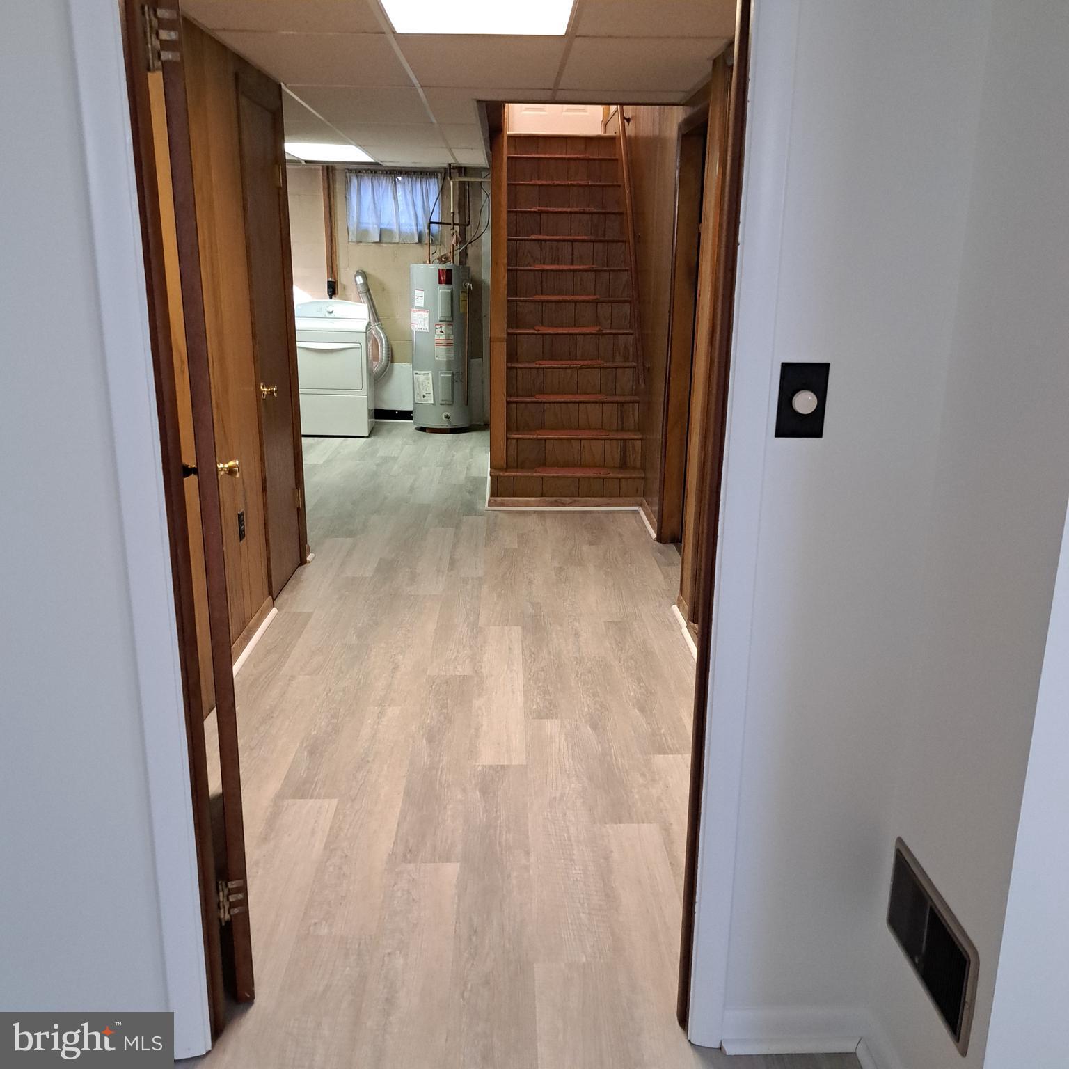 9301 Tuckerman Street Lanham, MD 20706 - Photo 35 of 48 a view of livingroom with hardwood floor and a ceiling fan