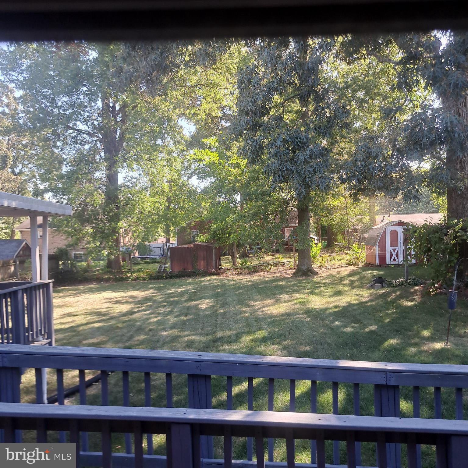 9301 Tuckerman Street Lanham, MD 20706 - Photo 10 of 48 a view of swimming pool from a window