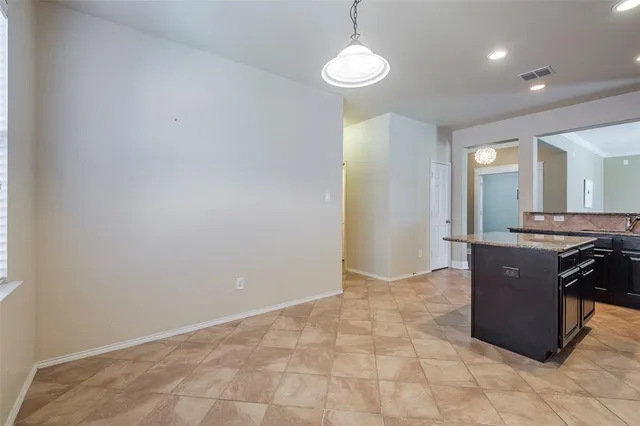a view of a kitchen with a sink