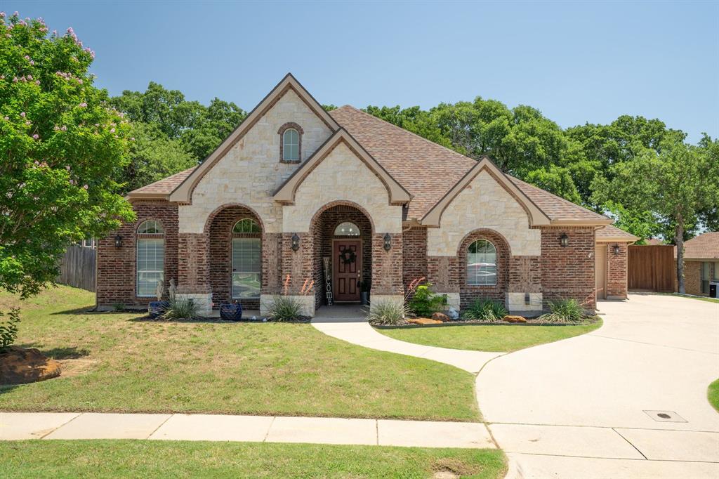 7101 Mira Vista Drive Denton, TX 76210 - Photo 1 of 1 a view of house with yard and green space