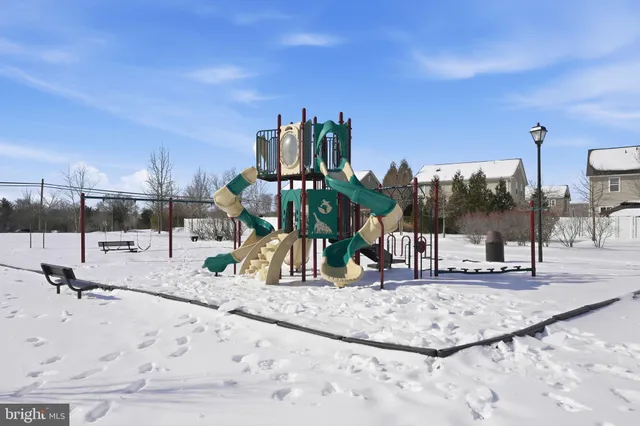 a view of a park with swings