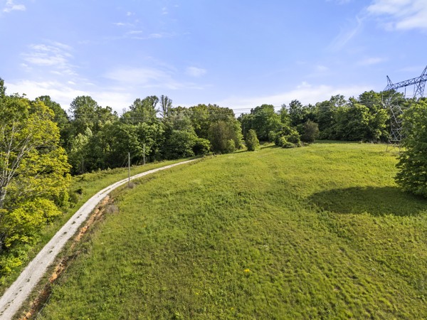 0 Clifton Cemetery Road Dickson, TN 37055 - Photo 2 of 9 a view of a field with an ocean