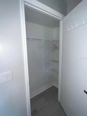 an empty room with yard and outdoor view