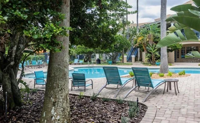 an outdoor space with patio furniture