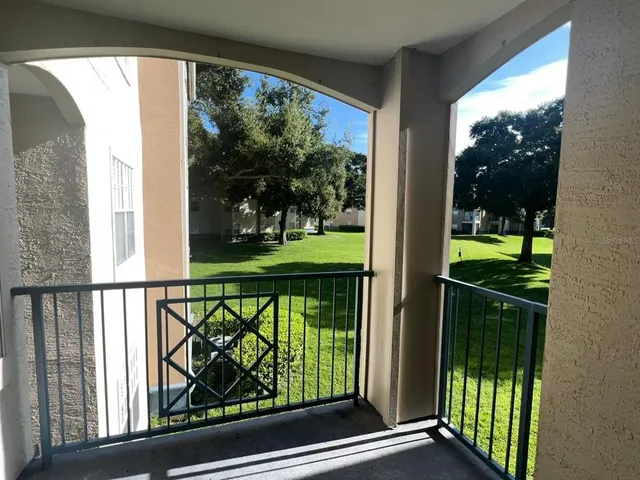 a view of a golf course with a lake
