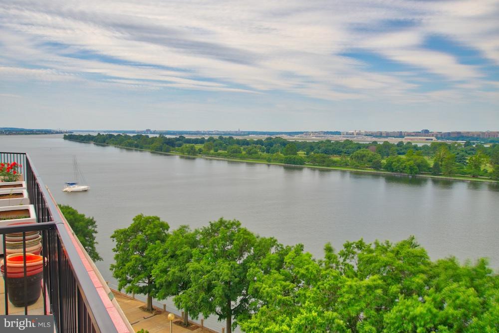 520 N Street Southwest, Unit S112 Washington, DC 20024 - Photo 2 of 30 a view of a lake from a balcony