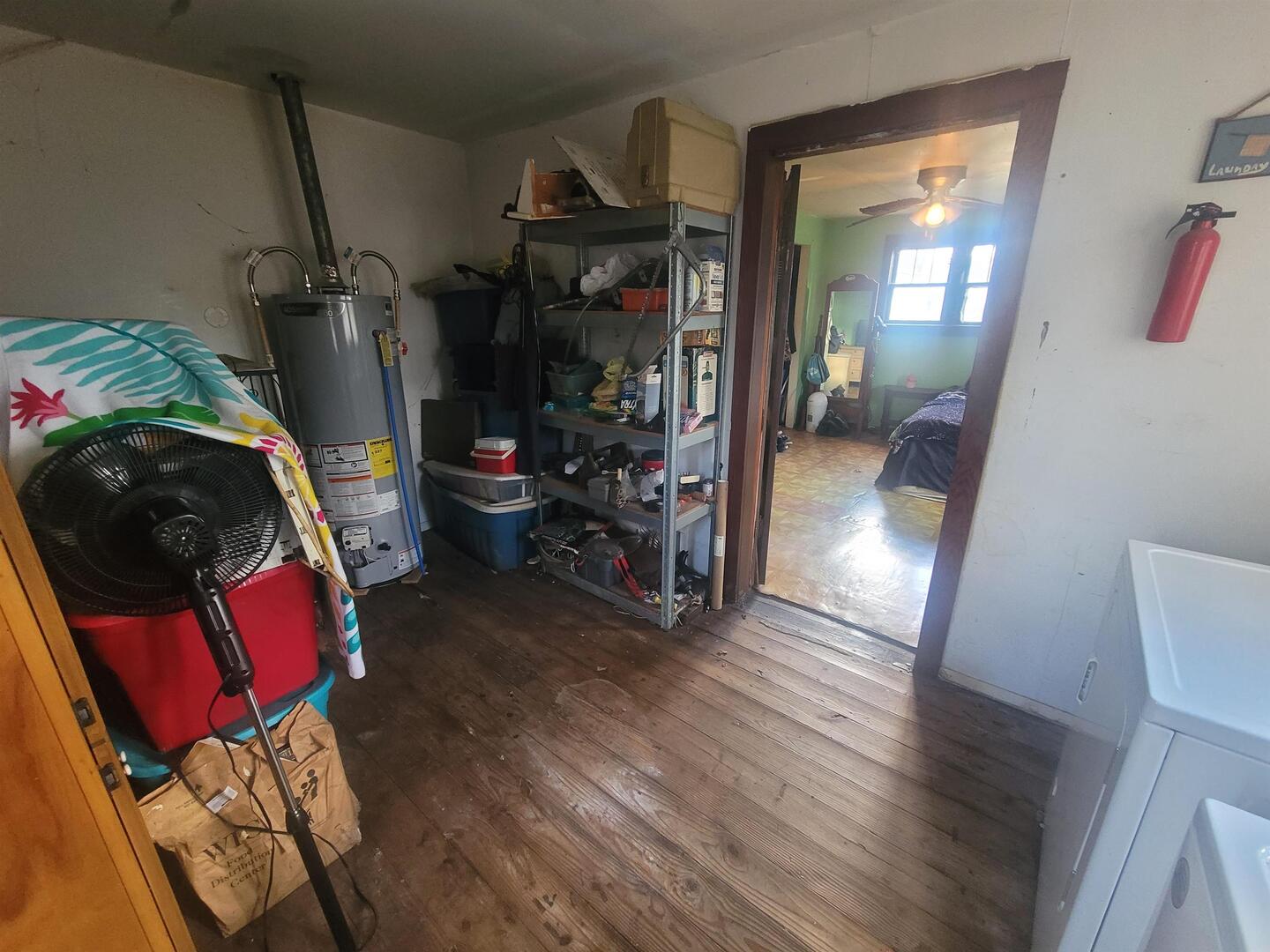108 North Walnut Street McLeansboro, IL 62859 - Photo 15 of 25 a view of walk in closet with clothes and shoes