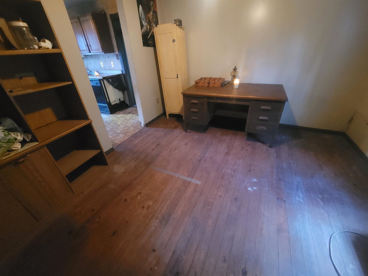 108 North Walnut Street McLeansboro, IL 62859 - Photo 19 of 25 a room with wooden floor and furniture