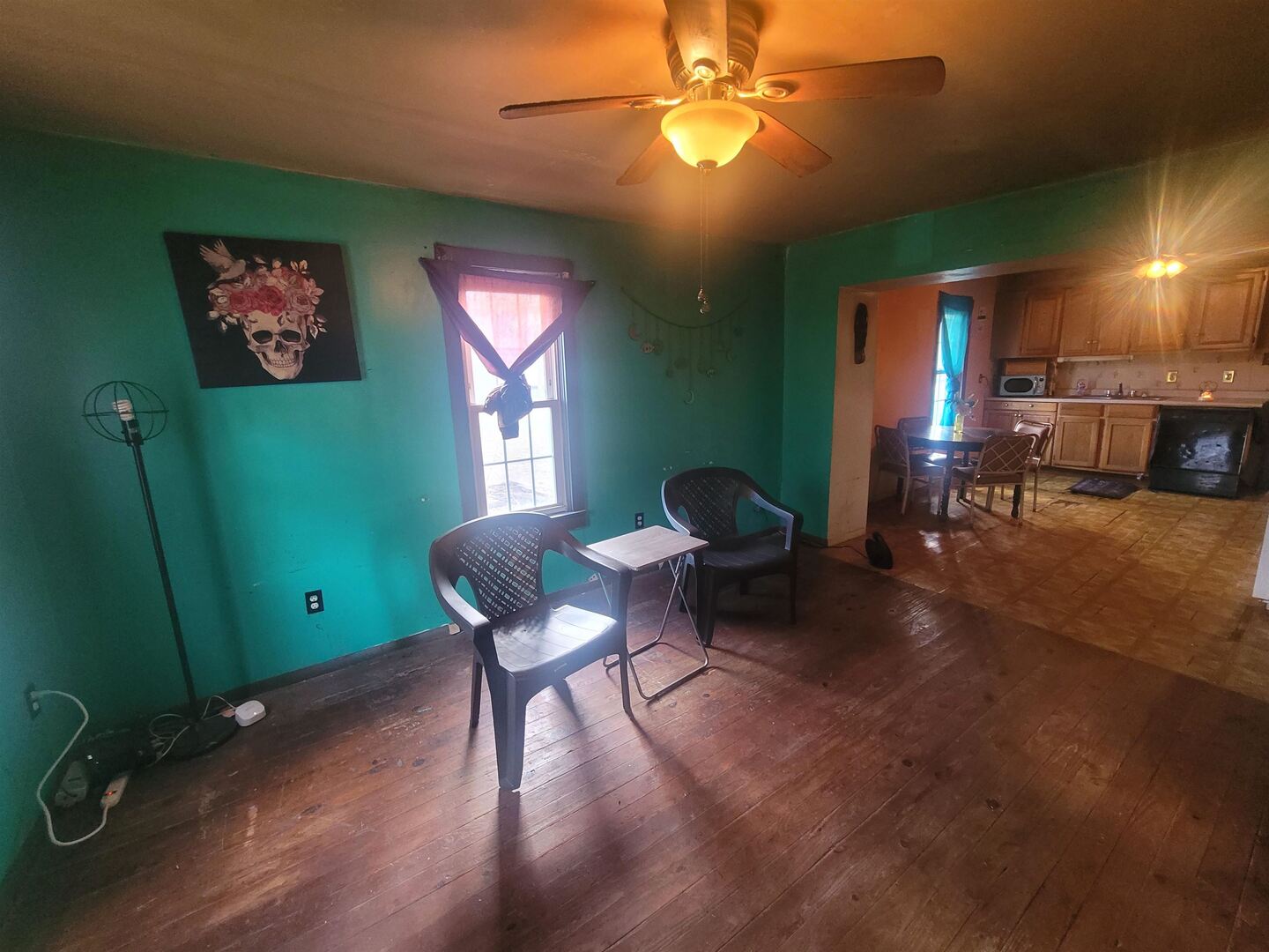 108 North Walnut Street McLeansboro, IL 62859 - Photo 6 of 25 a view of a livingroom with furniture and a chandelier