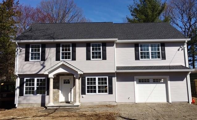 95 Crystal Lake Road Stamford, CT 06905 - Photo 1 of 1 a front view of a house with a garage