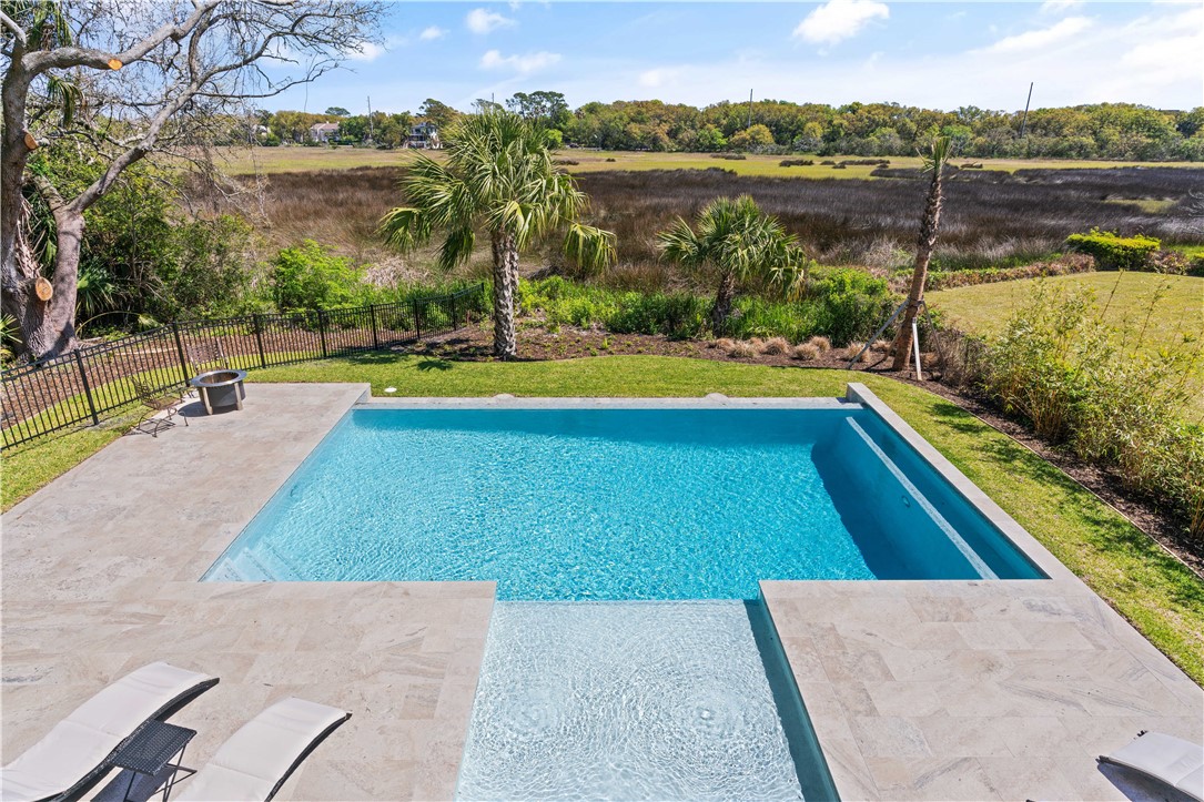 134 Compass Point Drive St. Simons Island, GA 31522 - Photo 65 of 77 Infinity pool with sun shelf