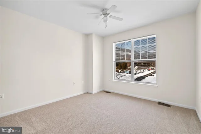 an empty room with window