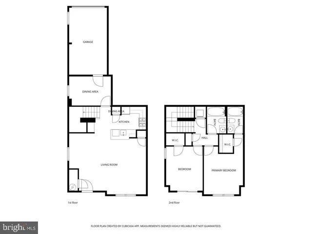 a picture of a bench in front of a gate