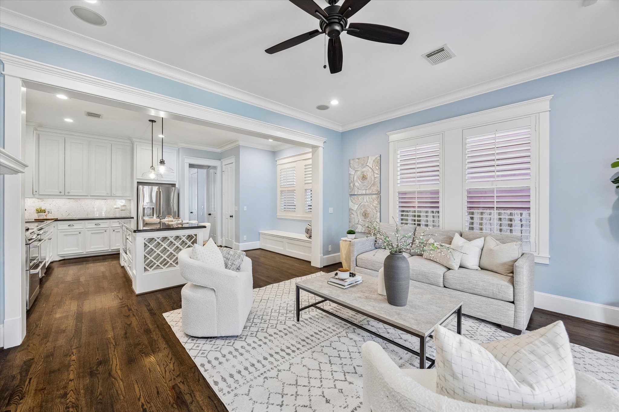 634 West 17th Street Houston, TX 77008 - Photo 14 of 42 This stylish and comfortable family room keeps everyone connected, with wood shuttered windows, a wide opening to the island kitchen, and plenty of space for relaxed evenings or casual gatherings.