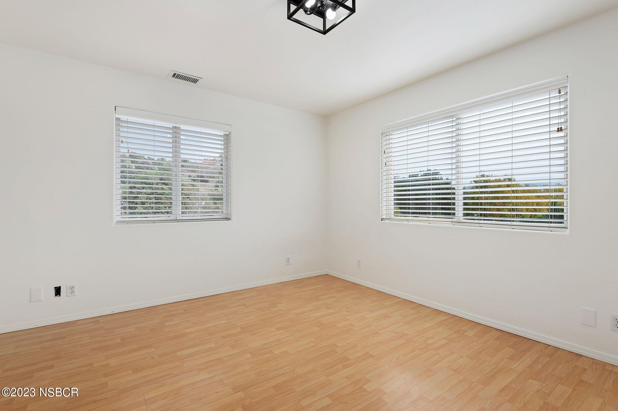 1180 Alamo Pintado Road Solvang, CA 93463 - Photo 12 of 20 a view of an empty room with a window