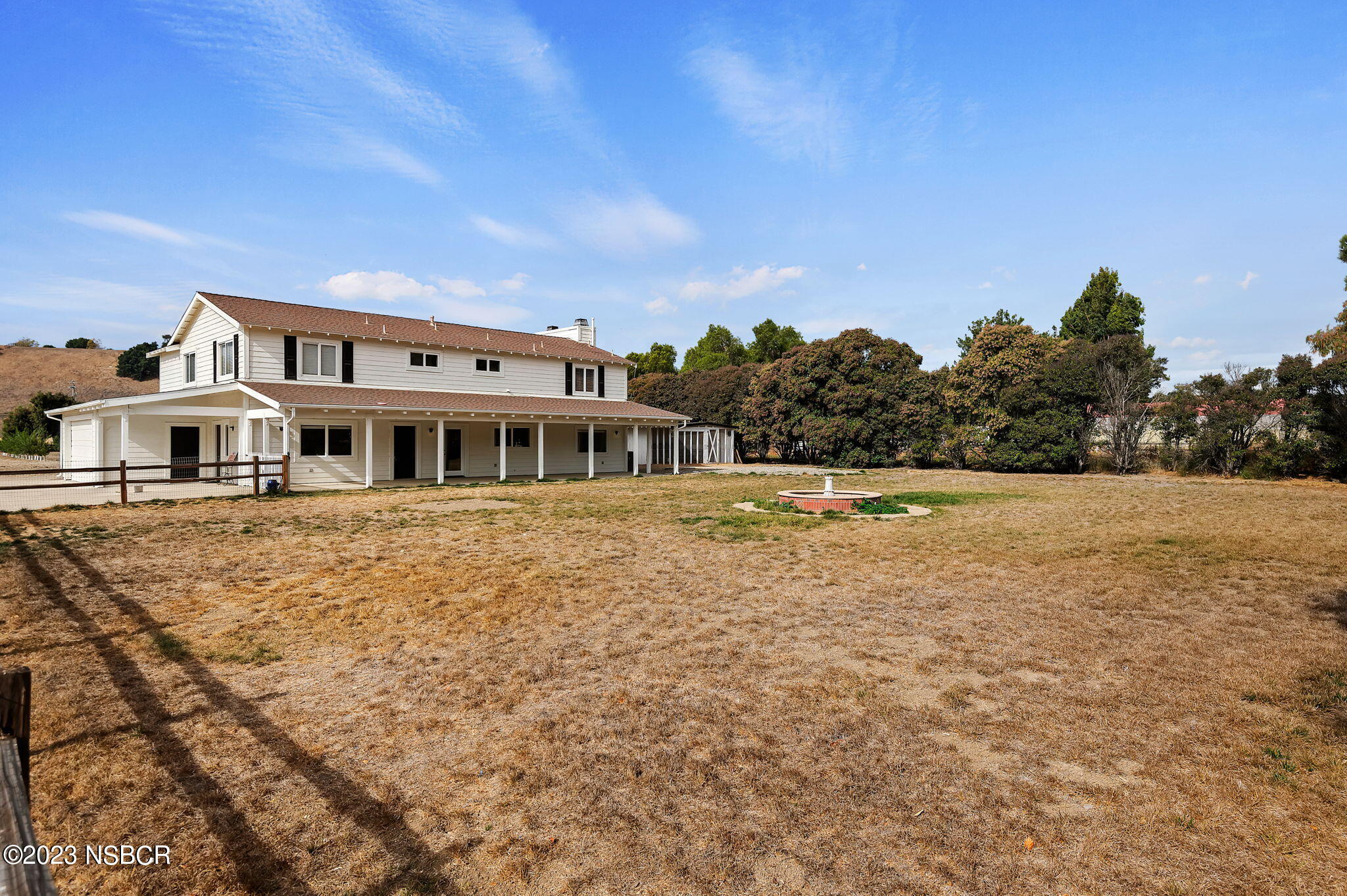 1180 Alamo Pintado Road Solvang, CA 93463 - Photo 17 of 20 a front view of a house with a yard
