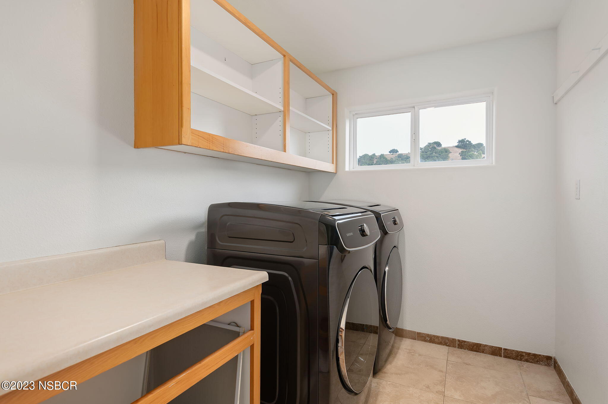 1180 Alamo Pintado Road Solvang, CA 93463 - Photo 19 of 20 a utility room with dryer and washer
