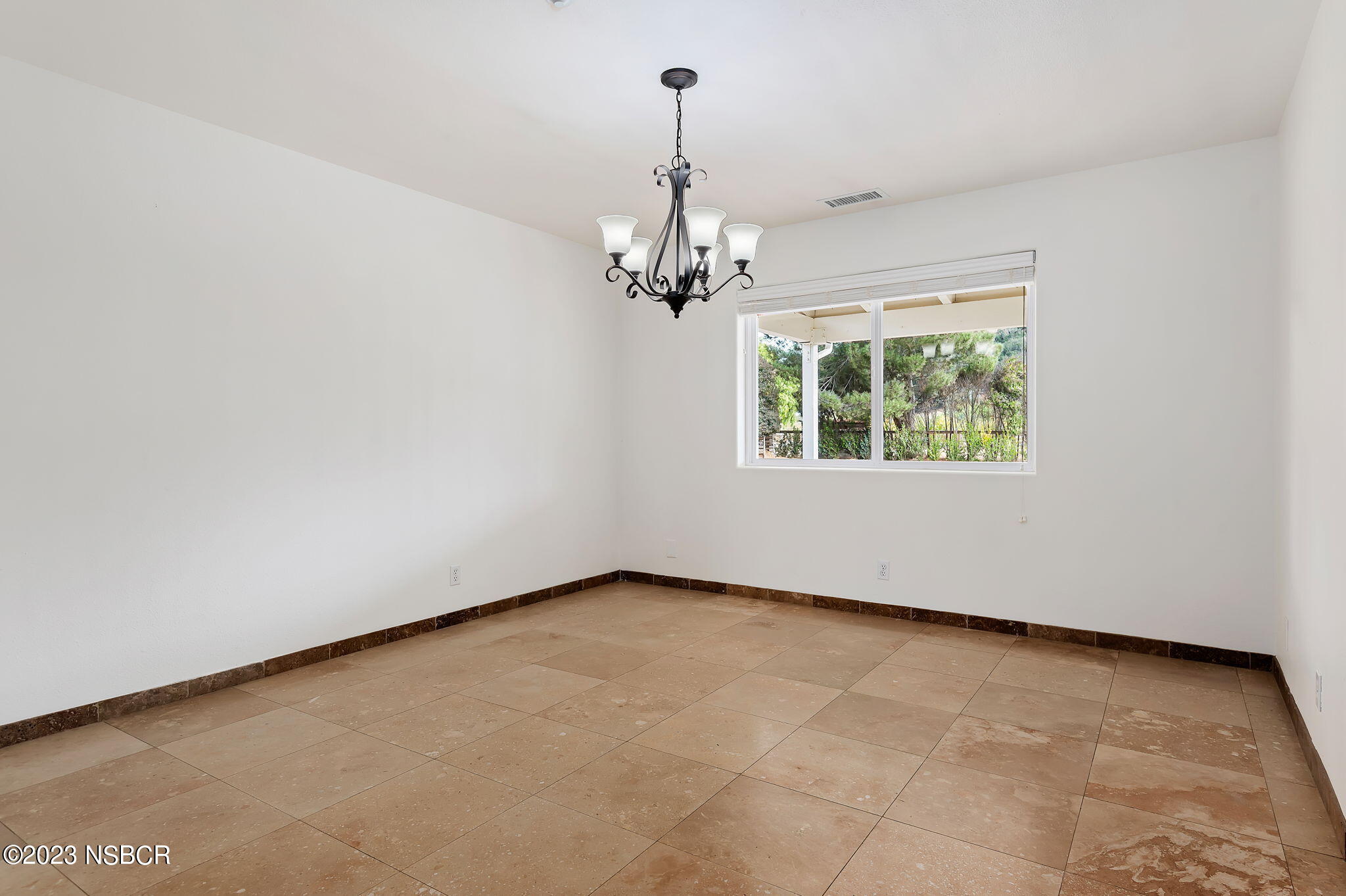 1180 Alamo Pintado Road Solvang, CA 93463 - Photo 4 of 20 an empty room with a window