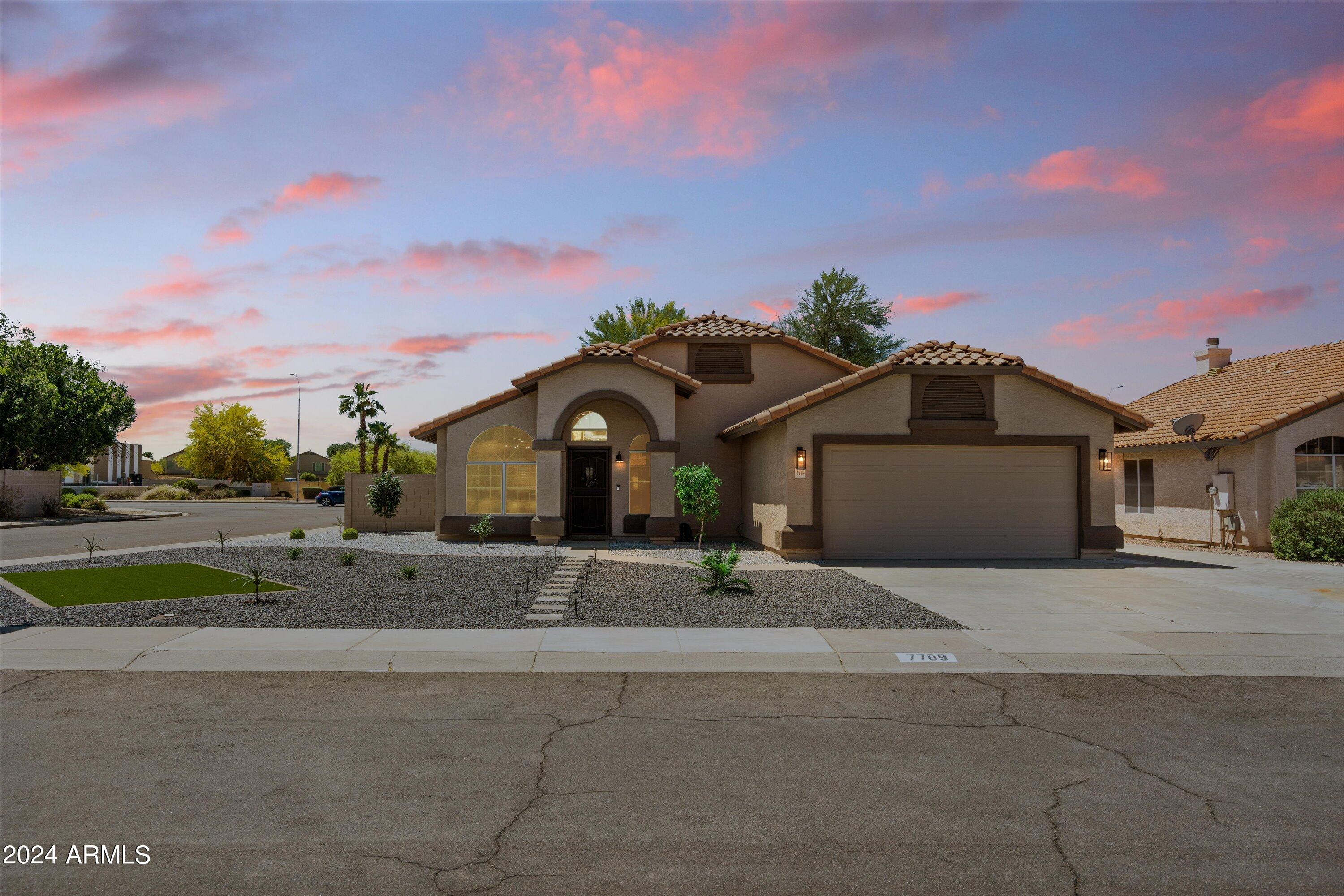 7709 West Boca Raton Road Peoria, AZ 85381 - Photo 1 of 45 Twilight front