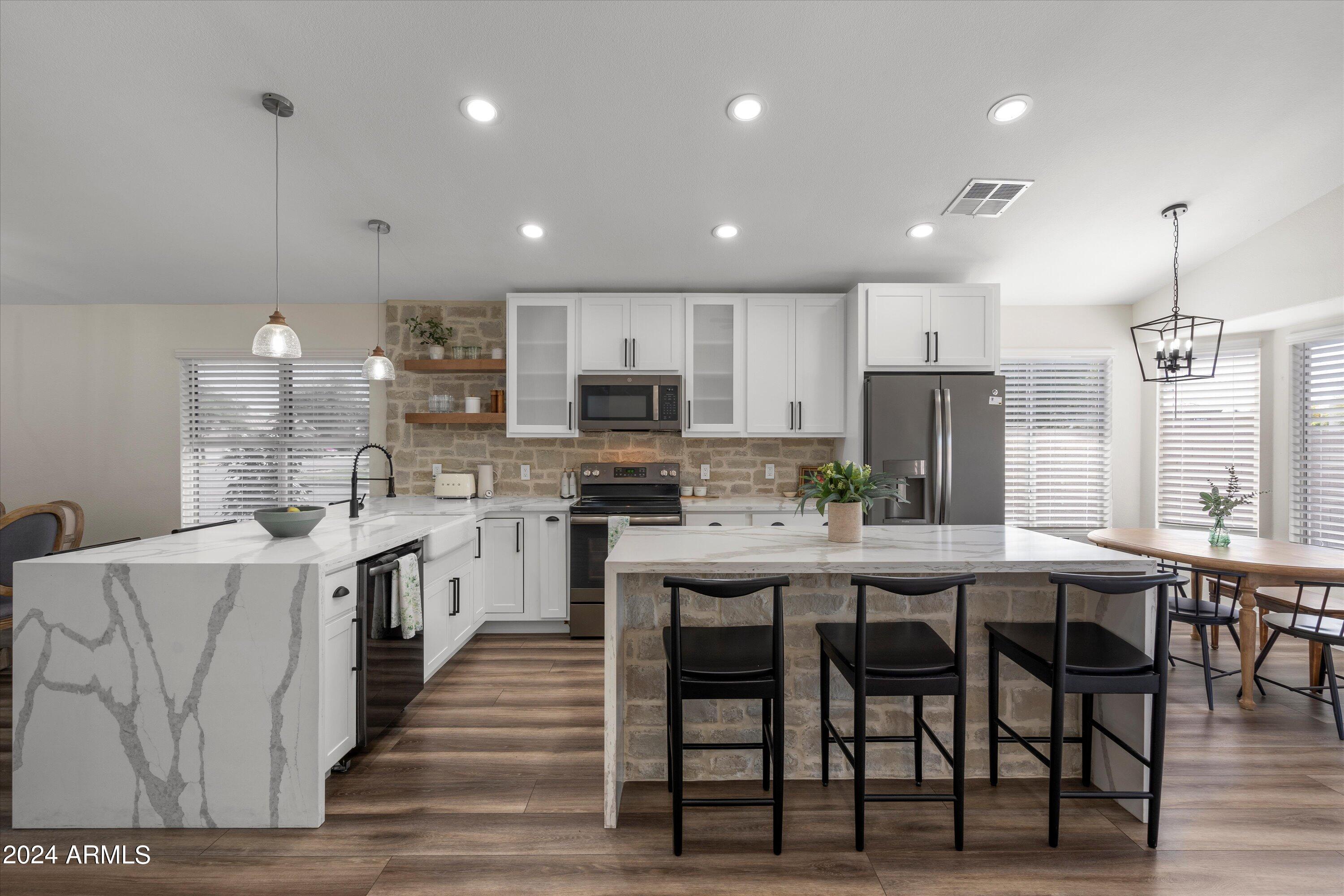7709 West Boca Raton Road Peoria, AZ 85381 - Photo 15 of 45 Gorgeous stone accents