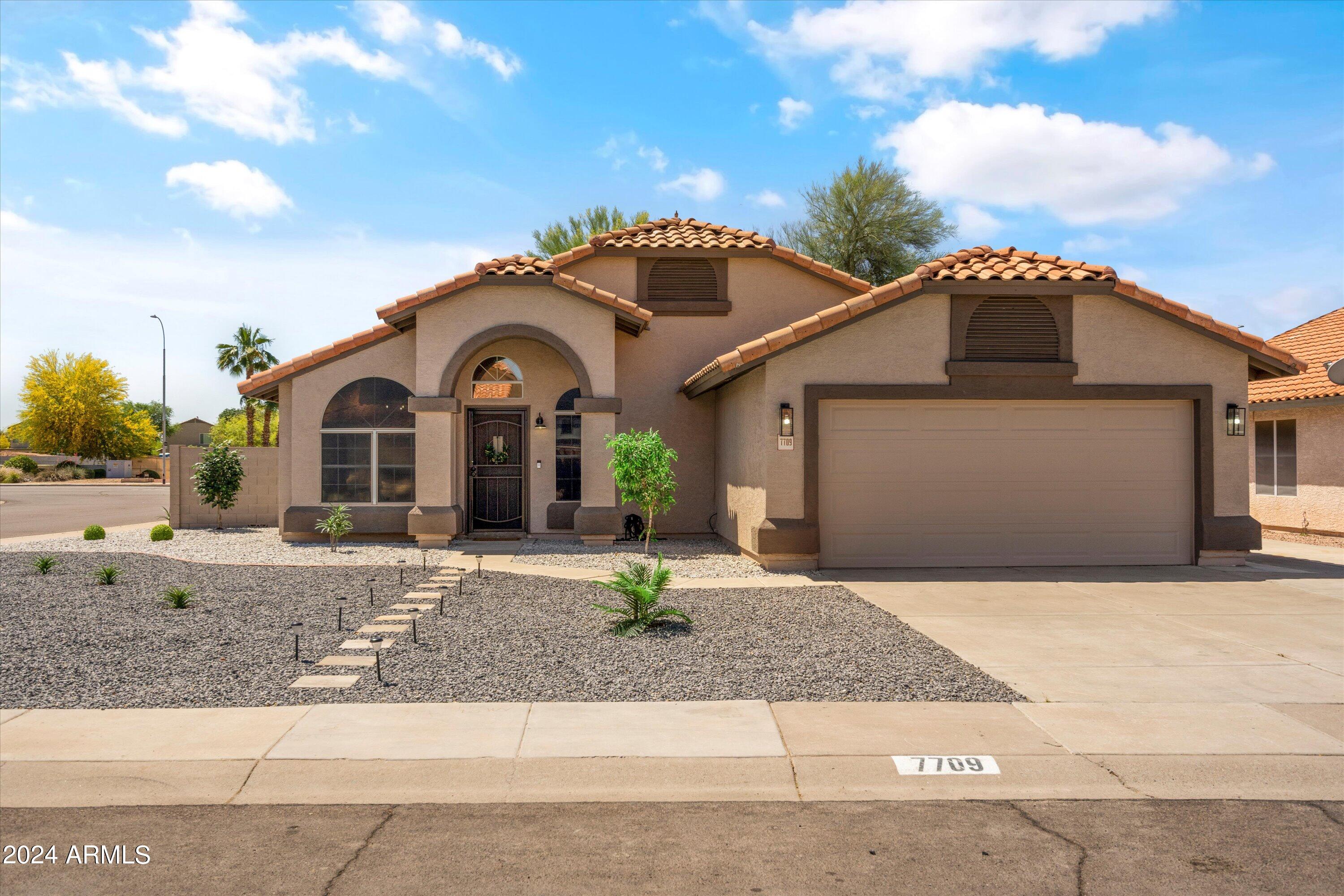 7709 West Boca Raton Road Peoria, AZ 85381 - Photo 3 of 45 Sunny front