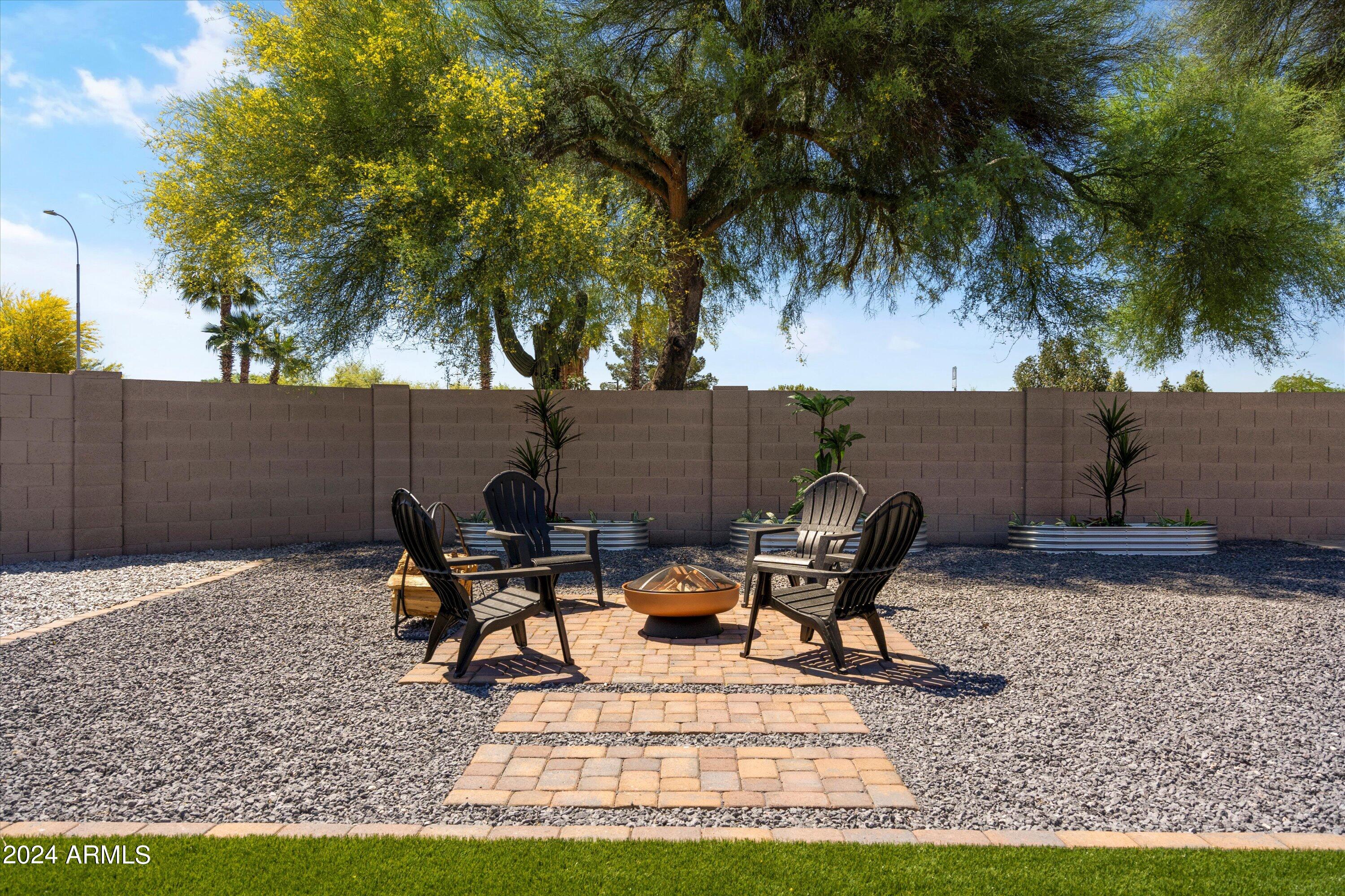 7709 West Boca Raton Road Peoria, AZ 85381 - Photo 35 of 45 New landscaping back