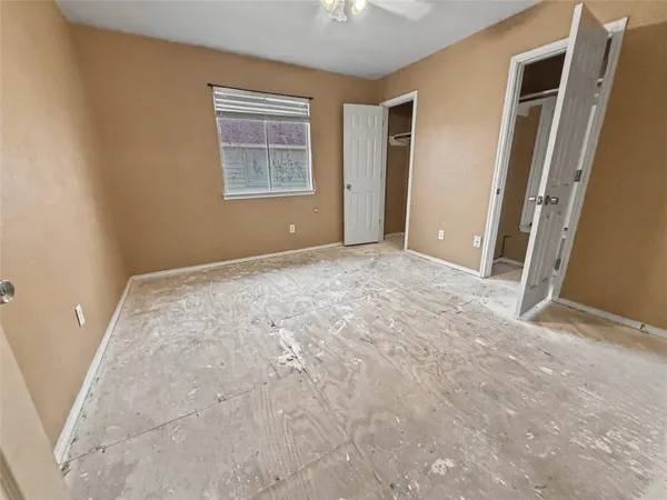 an empty room with windows