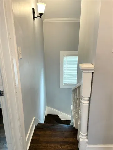 a view of entryway with wooden floor