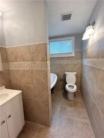 a bathroom with a toilet