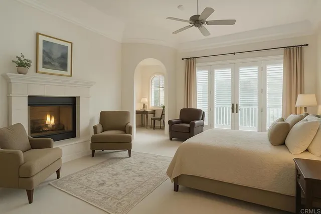 a bedroom with a bed mirror and window