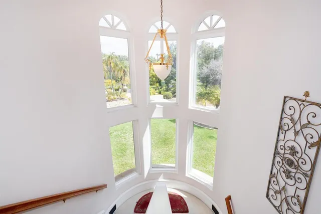 a view of house with a yard