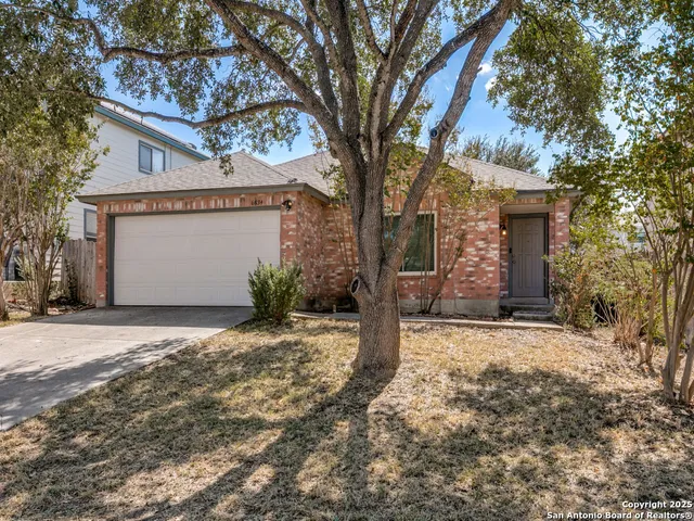 a house with trees in front of it