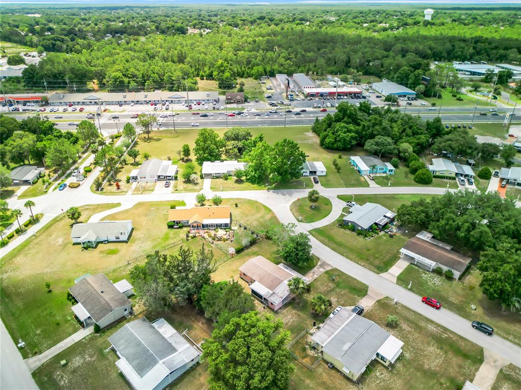 8917 Southwest 104th Place Ocala, FL 34481 - Photo 34 of 41 an aerial view of residential houses with outdoor space and swimming pool