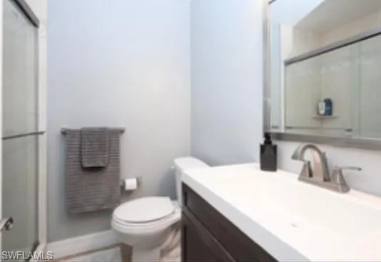 a bathroom with a sink and a toilet