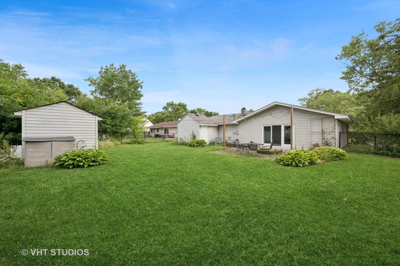 605 Northview Lane Hoffman Estates, IL 60169 - Photo 16 of 19 a aerial view of a house with backyard and garden