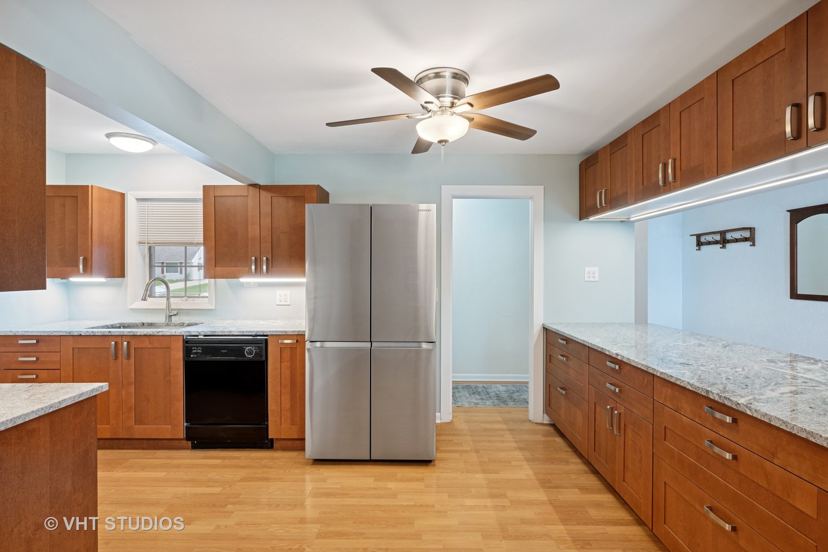 605 Northview Lane Hoffman Estates, IL 60169 - Photo 6 of 19 a kitchen with stainless steel appliances granite countertop a refrigerator a sink and a stove