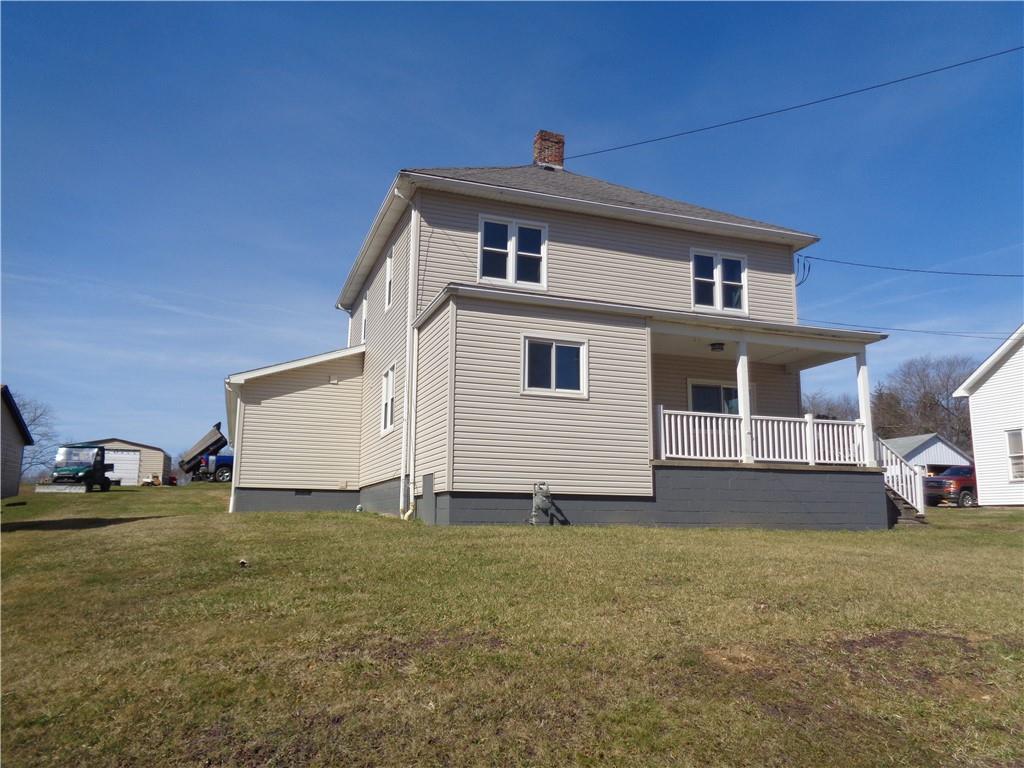 991 Main Street Rimersburg, PA 16248 - Photo 1 of 36 a front view of a house with a yard