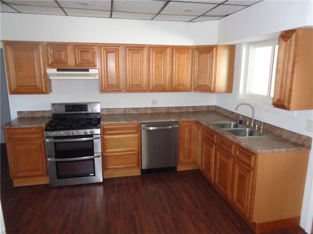 991 Main Street Rimersburg, PA 16248 - Photo 12 of 36 a kitchen with a sink stove top oven and cabinets
