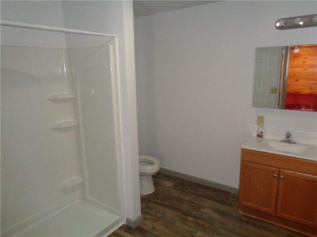 991 Main Street Rimersburg, PA 16248 - Photo 25 of 36 a bathroom with a granite countertop sink toilet and shower