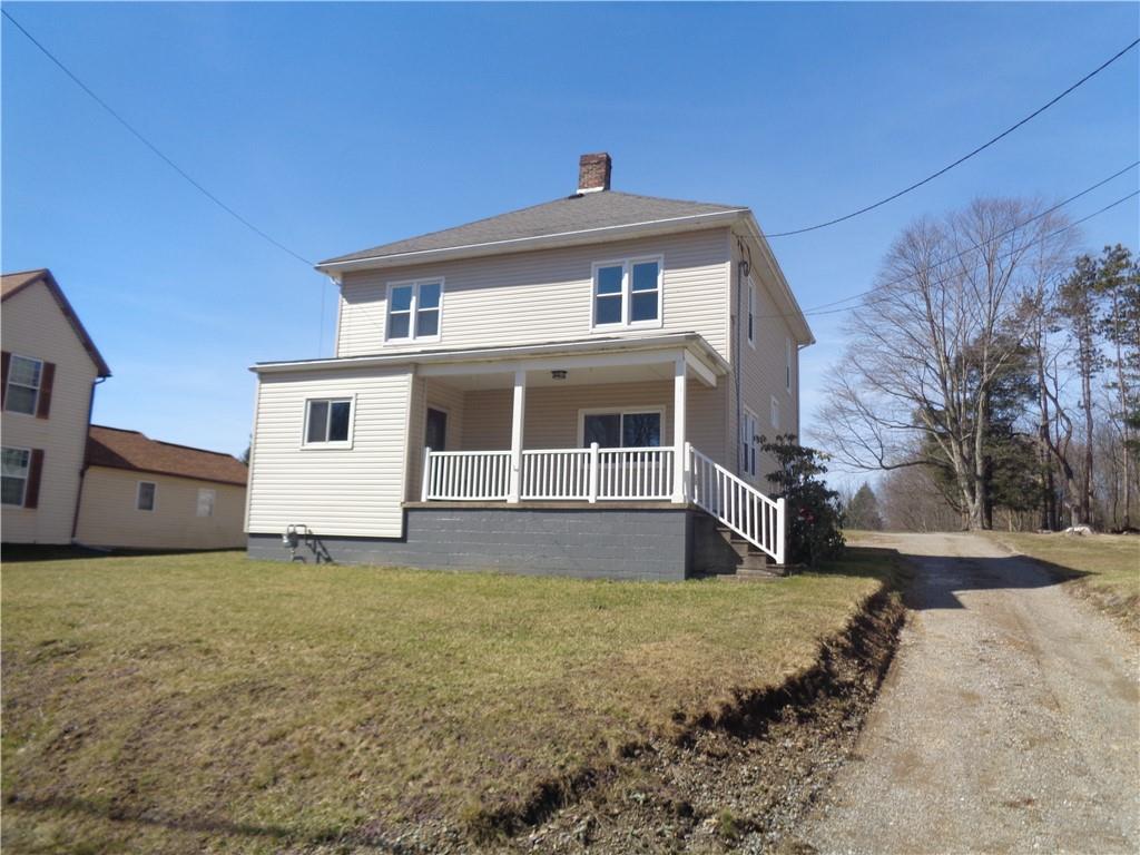 991 Main Street Rimersburg, PA 16248 - Photo 3 of 36 a front view of a house with a yard