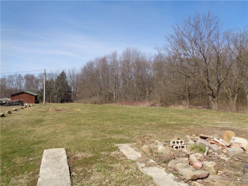 991 Main Street Rimersburg, PA 16248 - Photo 8 of 36 a view of a yard with an trees