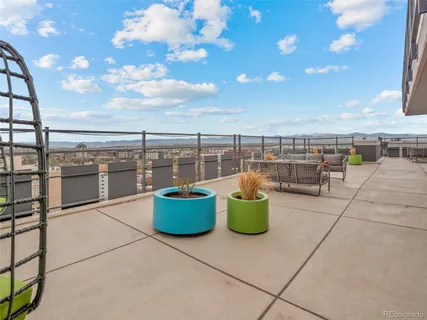 a view of roof deck with seating space