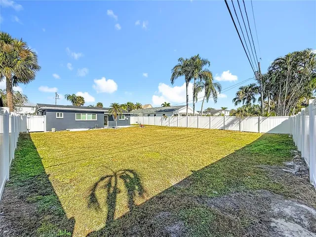 a view of swimming pool with patio